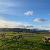 Our rustic play area with picnic benches is fun for everyone